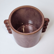 Load image into Gallery viewer, The Leaferie Juro red planter with many handles. ceramic material top view of pot
