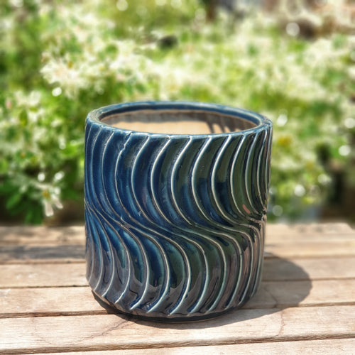 The Leaferie Imperial blue ceramic pot. with waves