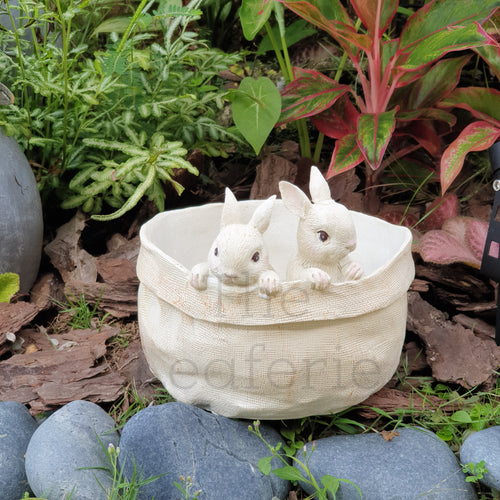 The Leaferie Lola Bunny flowerpot . resin material. 2 bunnies front view