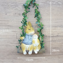 Load image into Gallery viewer, The Leaferie Lilly Belle Bunny. made from resin. rabbit on a swing. Front view and size
