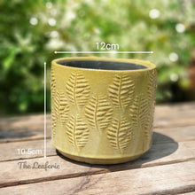 Load image into Gallery viewer, The Leaferie Aswan plant pot . green ceramic planter. top view . measurement
