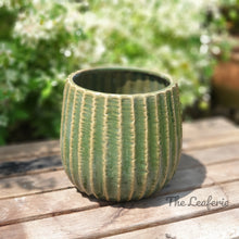 Load image into Gallery viewer, The Leaferie Batura Green ceramic pot. front view
