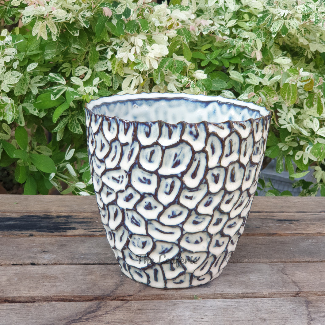The Leaferie Azur plant pot. blue ceramic planter. front view