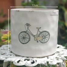 Load image into Gallery viewer, The Leaferie colson bicycle plant pot. ceramic bike planter . front view. size
