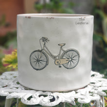 Load image into Gallery viewer, The Leaferie colson bicycle plant pot. ceramic bike planter . front view
