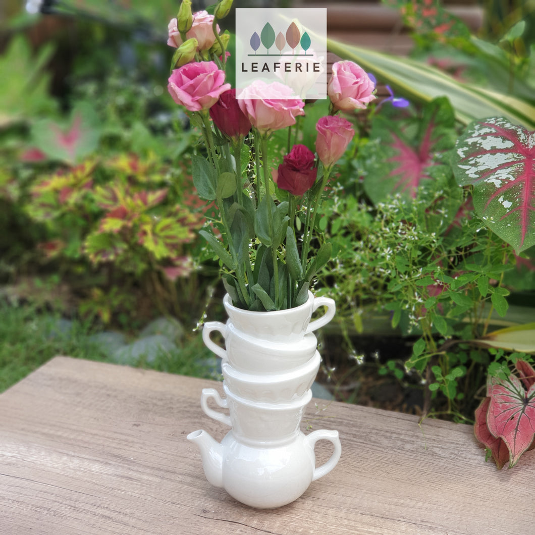 The Leaferie Calla vase. ceramic cup stacked cup design . Pearlescent colour . front view