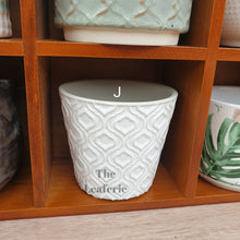 Load image into Gallery viewer, The Leaferie Mini Pots Series 1 . 10cm pots. 12 designs. Front view of all design J
