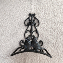 Load image into Gallery viewer, The Leaferie cast iron water hose holder. front view
