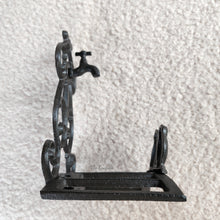 Load image into Gallery viewer, The Leaferie cast iron water hose holder. side view
