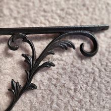 Load image into Gallery viewer, The Leaferie Cast Iron hanging hook 1 . close up of flower view
