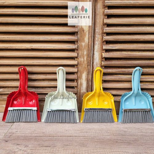The Leaferie Dulton Broom and dustpan set. metal and comes in 4 colours. front view of all 4 colours