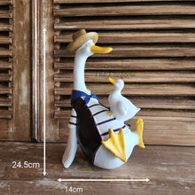 Load image into Gallery viewer, The Leaferie Donnie Duck Garden decoration. made from Resin. duck with duckling side view size

