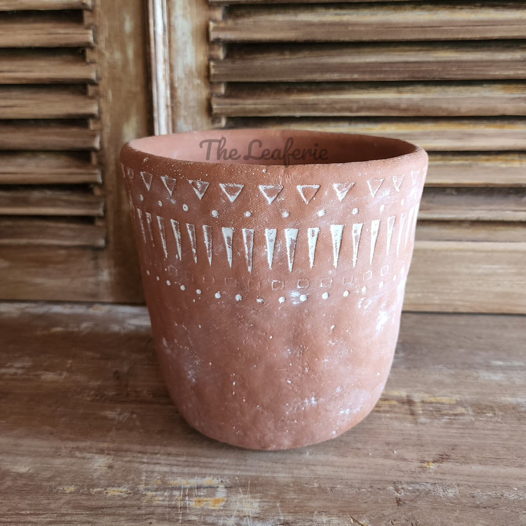 The Leaferie JAru terrcotta pot. 2 designs . front view of design B