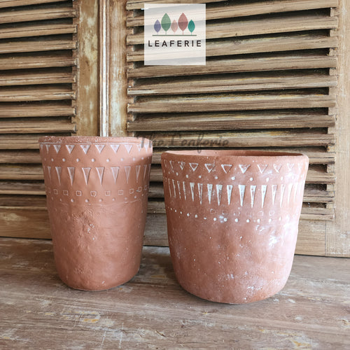 The Leaferie JAru terrcotta pot. 2 designs . front view of 2 designs