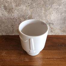 Load image into Gallery viewer, The Leaferie Axel plant pot .white ceramic face plant pot. Design A top view
