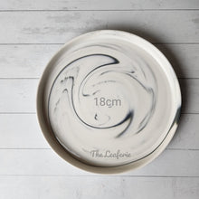 Load image into Gallery viewer, The Leaferie Marbled like round ceramic trays. 6 designs. white marble . top view of size 18cm
