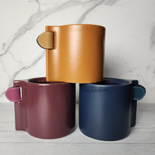 Load image into Gallery viewer, The Leaferie Sacha pot. 3 colours. ceramic and leather material
