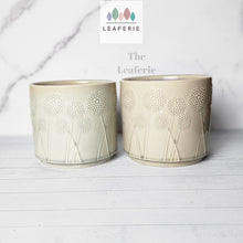 Load image into Gallery viewer, The Leaferie Dandelion Flowerpot ceramic plant pot with 2 designs. front view
