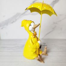 Load image into Gallery viewer, The Leaferie Damien the duck garden decoration.Yellow ducks with umbrella. 2 designs side view of design B
