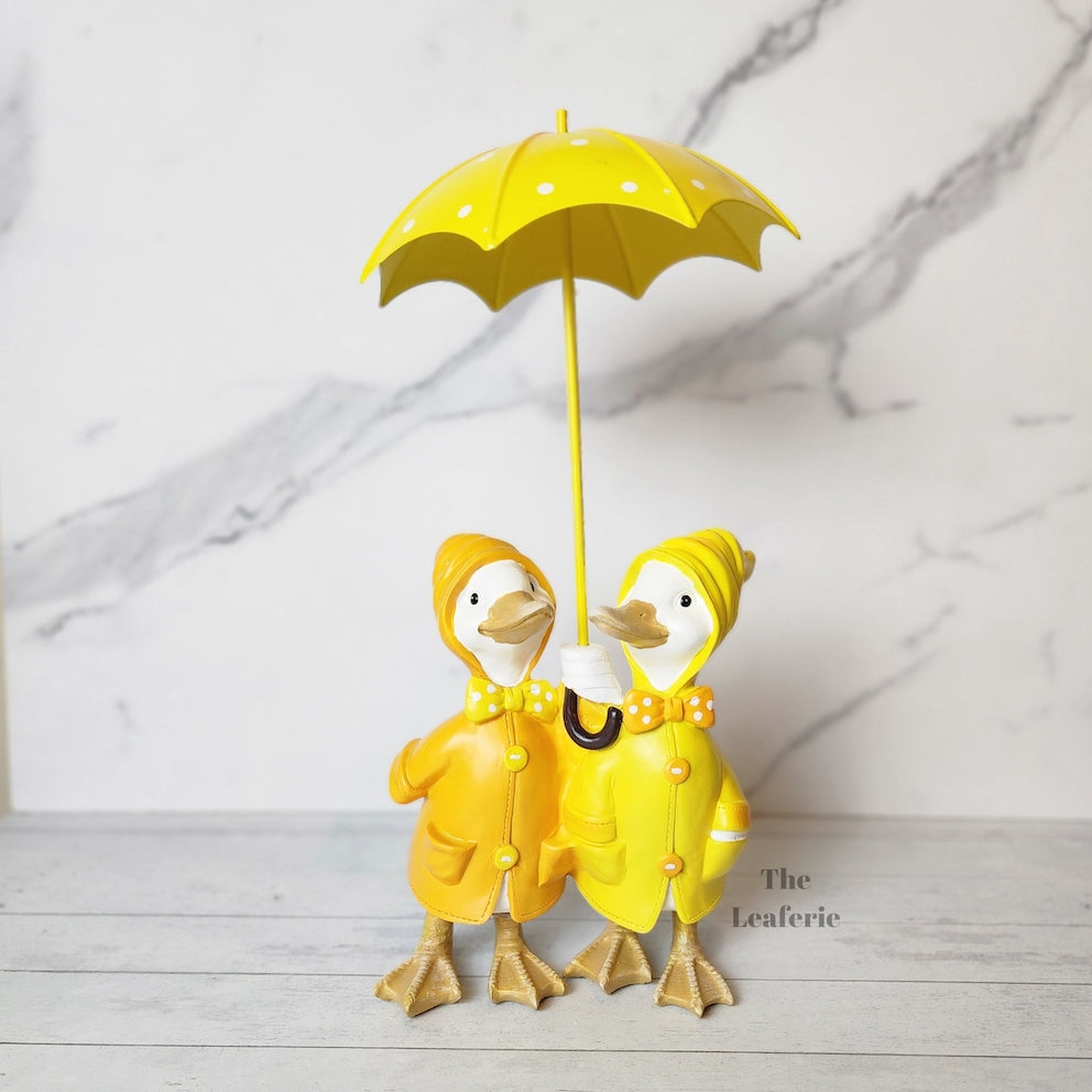 The Leaferie Damien the duck garden decoration.Yellow ducks with umbrella. 2 designs front view design A