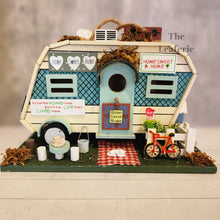 Load image into Gallery viewer, The Leaferie Hanging Caravan Bird house garden decoration. Made from wood. 
