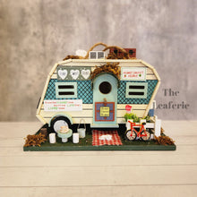 Load image into Gallery viewer, The Leaferie Hanging Caravan Bird house garden decoration. Made from wood. 

