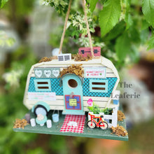 Load image into Gallery viewer, The Leaferie Hanging Caravan Bird house garden decoration. Made from wood. 
